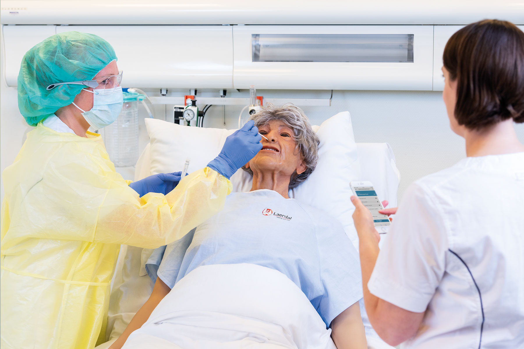 Two people doing nursing education with SimCapture