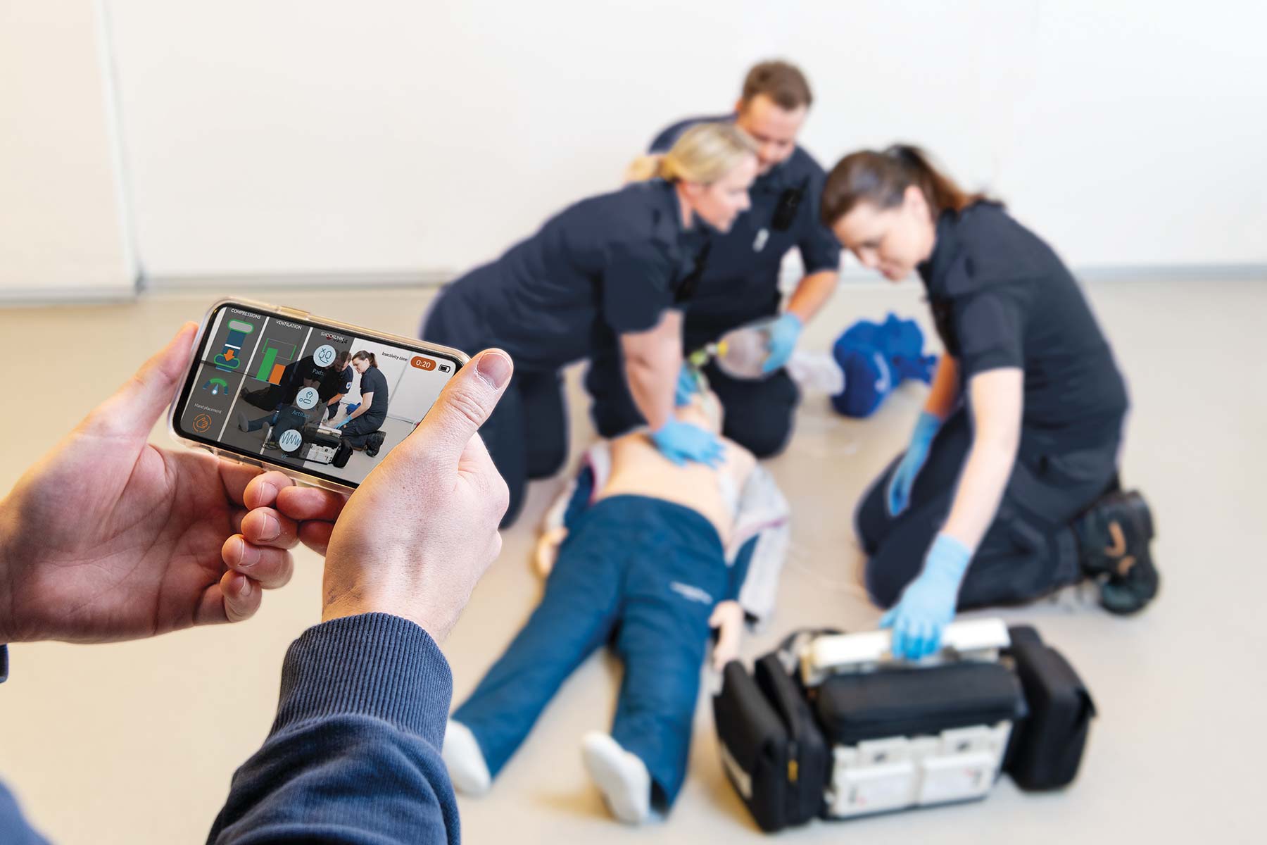 EMTs using teamreporter and performing cpr