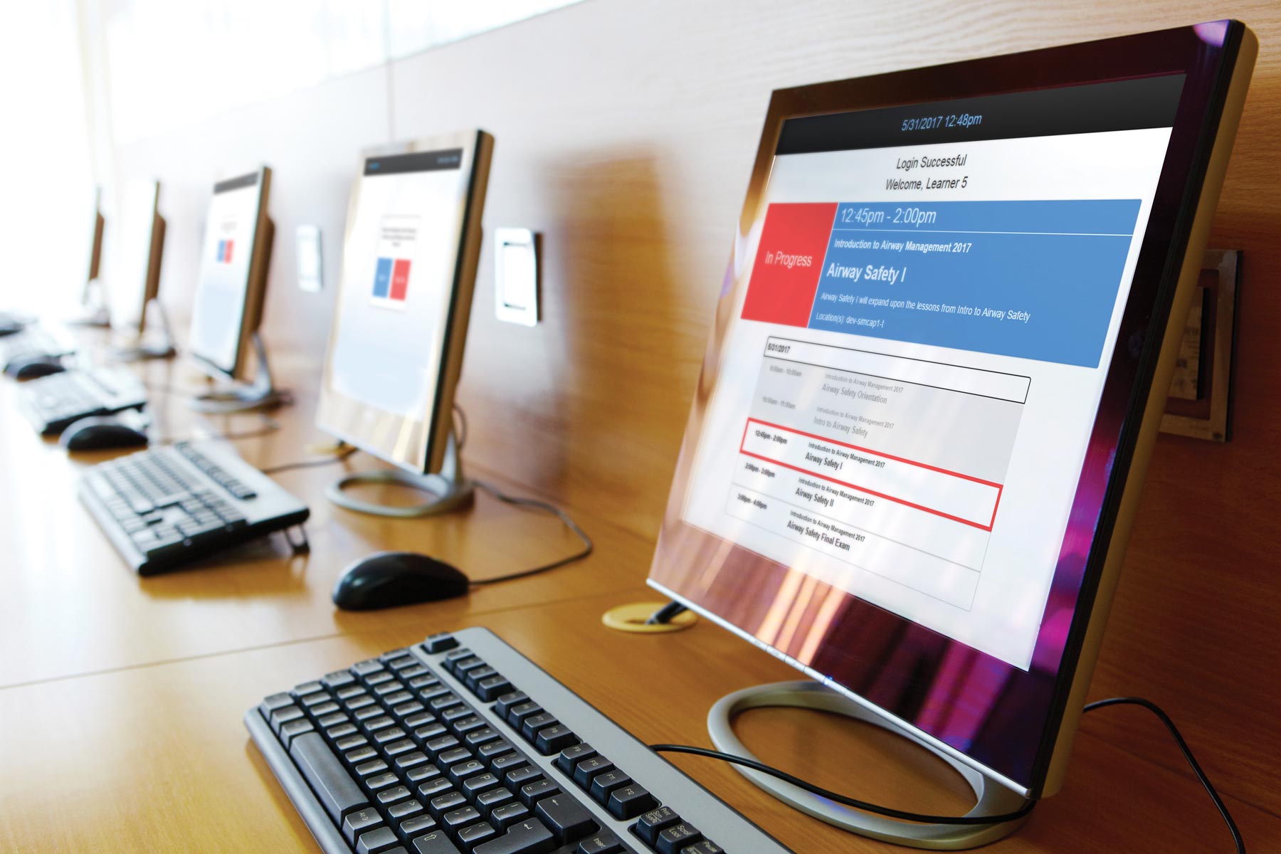 Computer screens on a desk