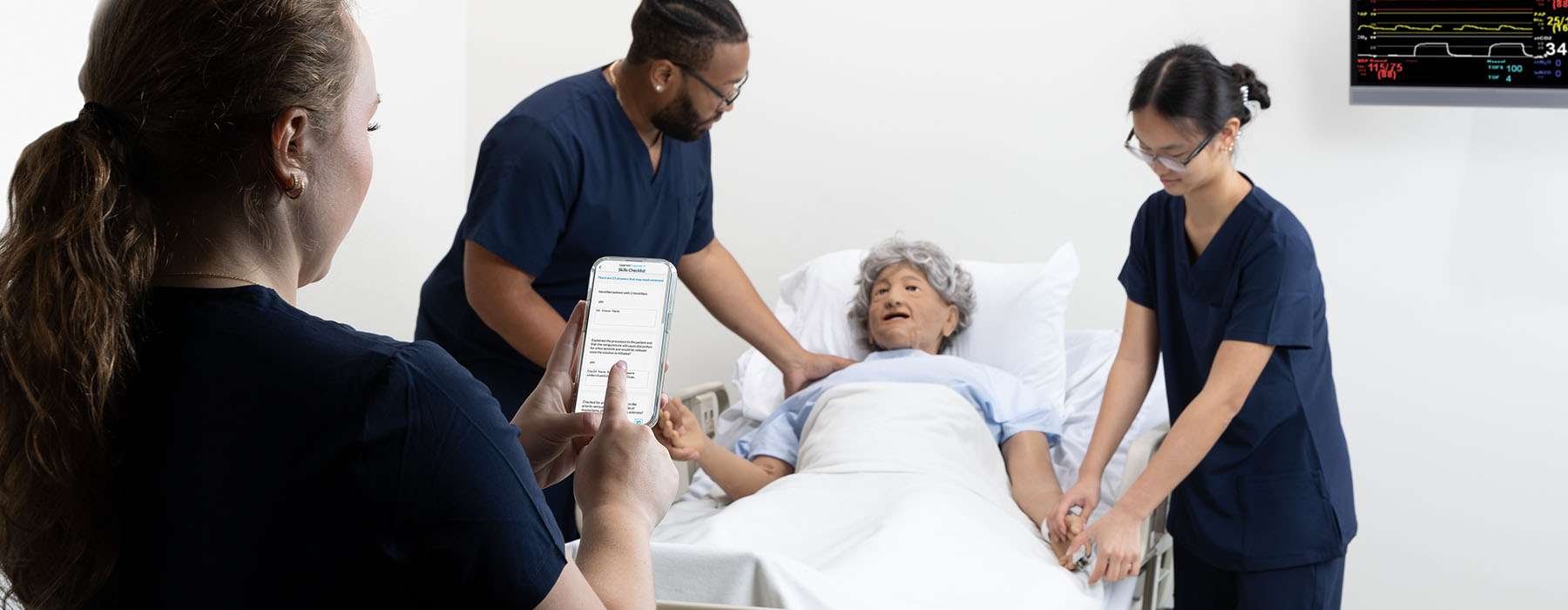nursing-assessment.jpg	A clinical instructor uses the SimCapture mobile app to evaluate students during a geriatric patient simulation with a high-fidelity manikin.