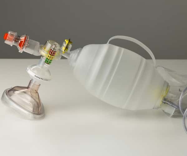 Manual resuscitator connected to breathing filter. Integrated PEEP-port and Manometer-port