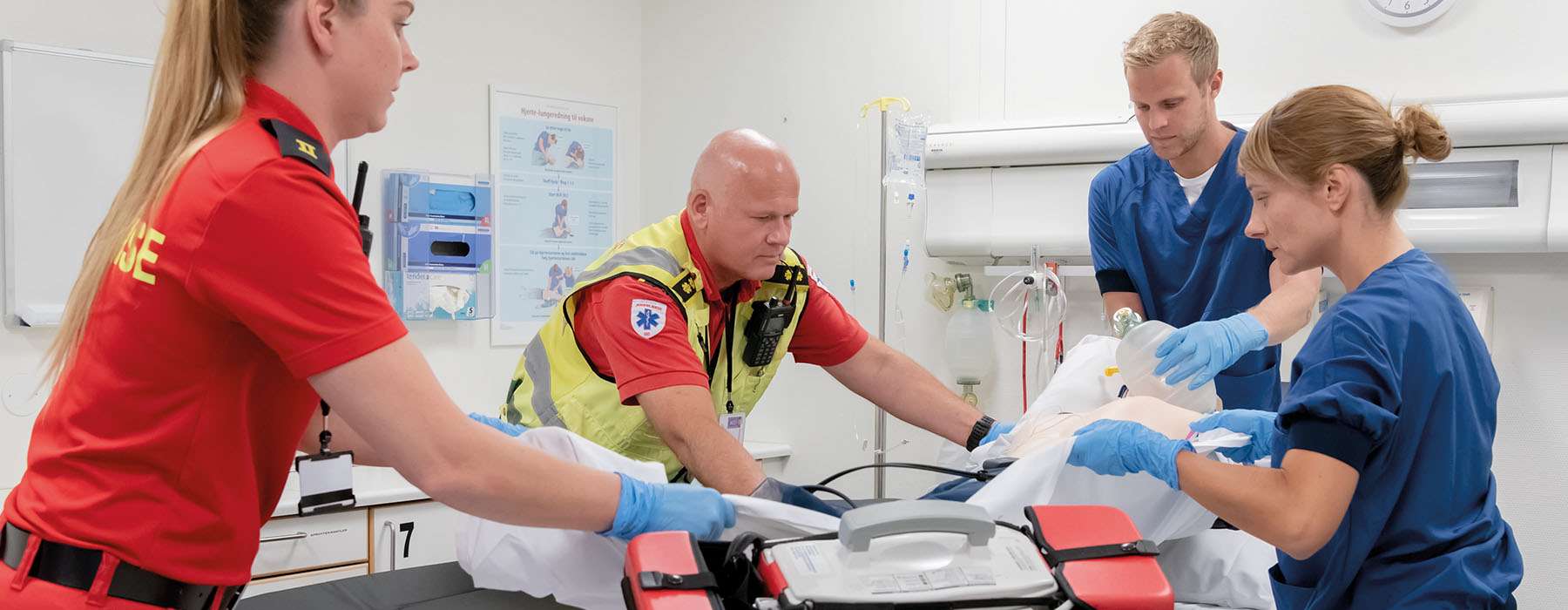 A team of healthcare professionals training in a hospital environment