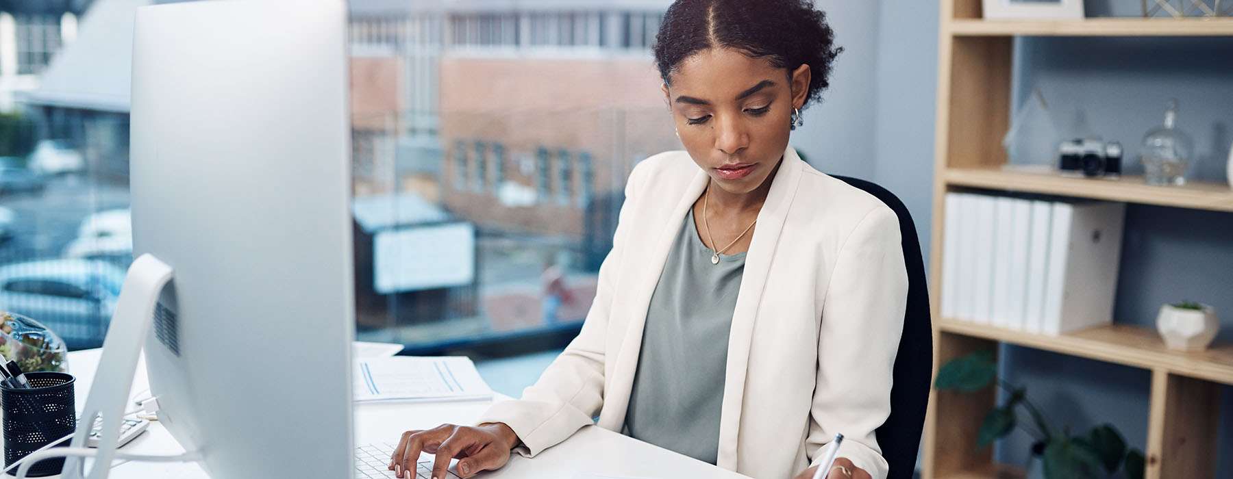 A woman working at her desk