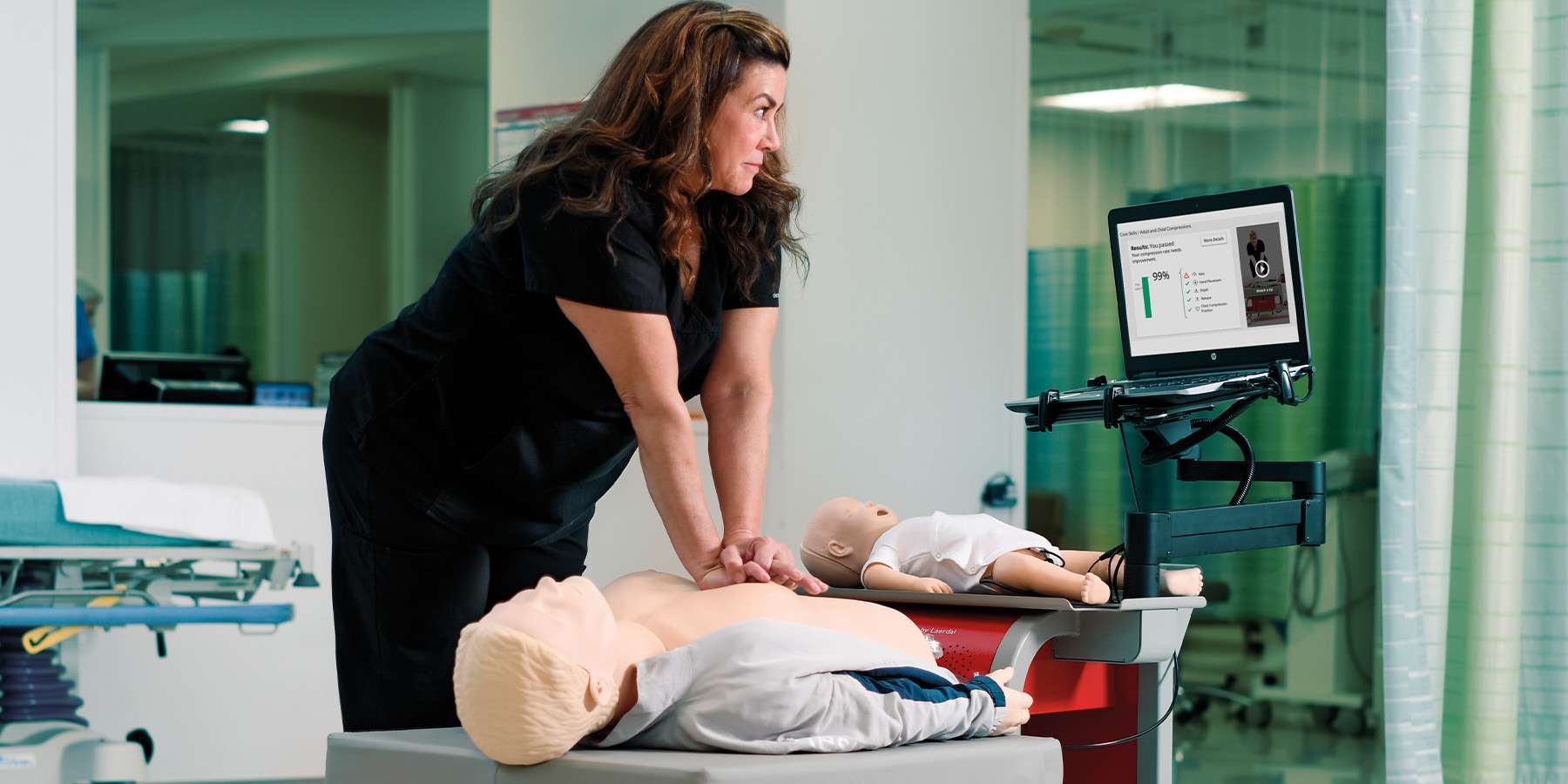 female nurse working on cpr training. RQI.