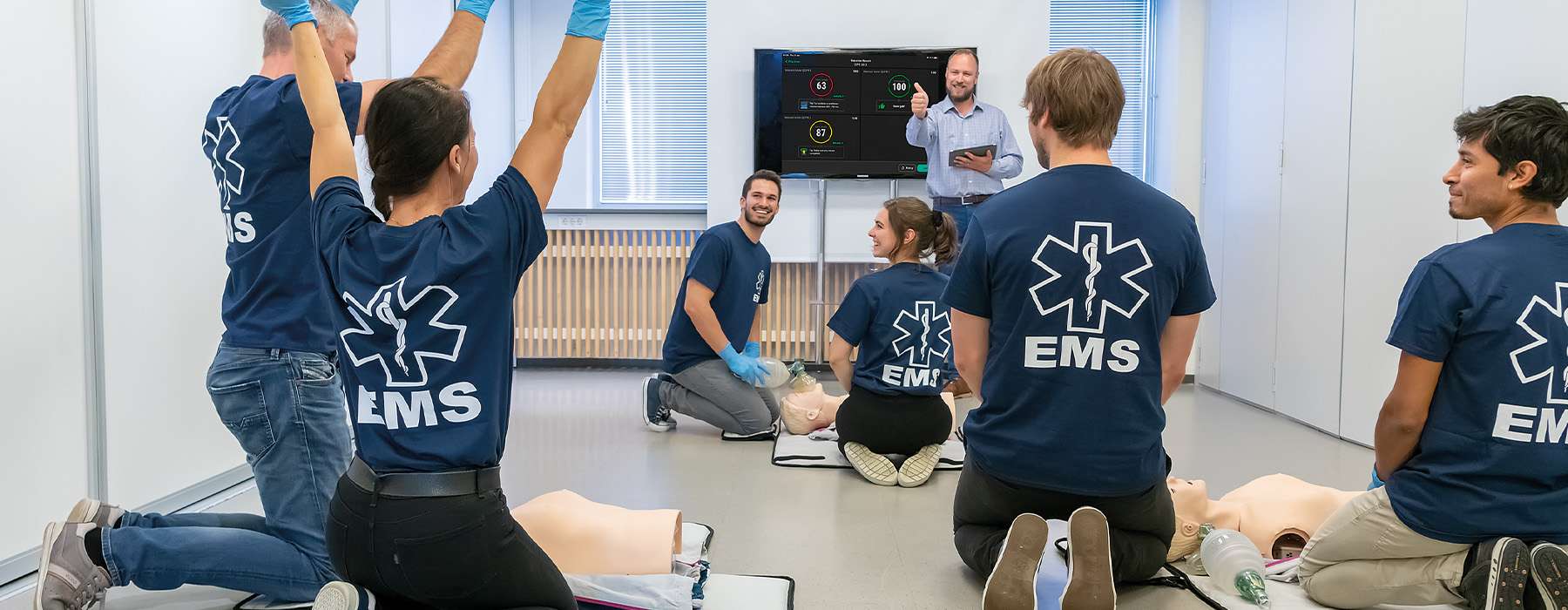 Team CPR training in meeting room