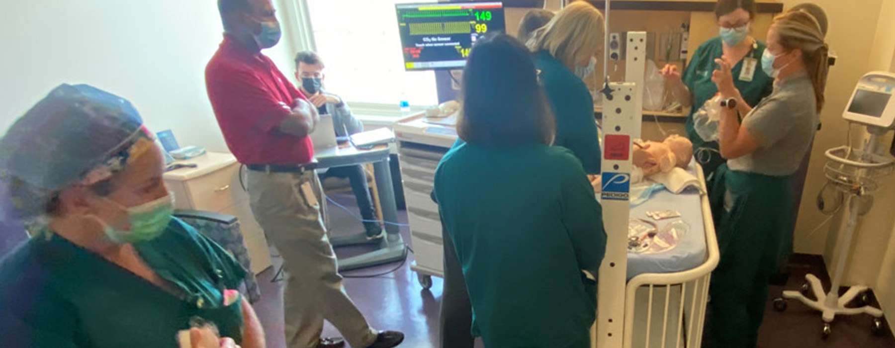 Boys Town National Research Hospital workers working on simulation