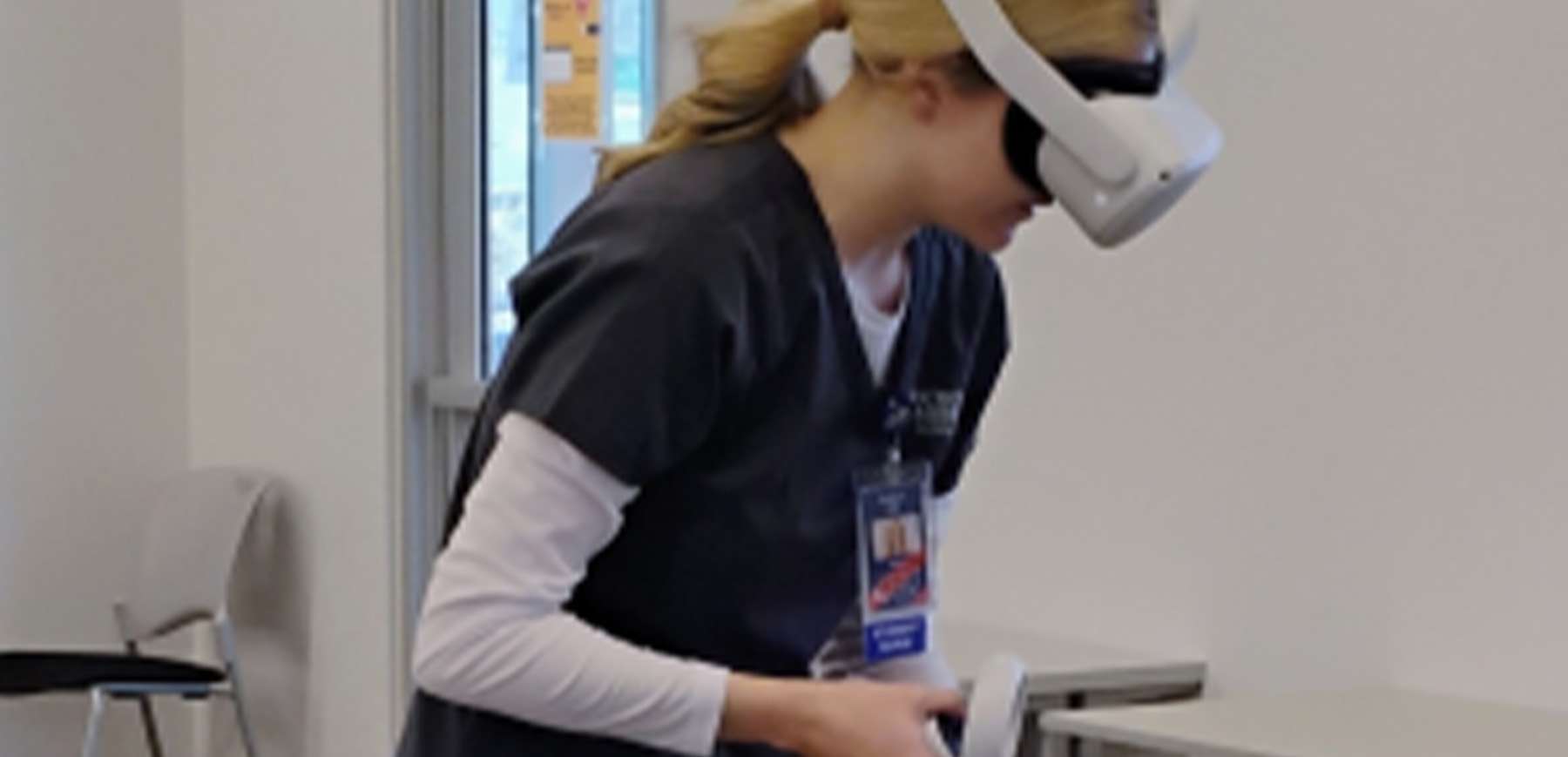 Single student using VR for training.
