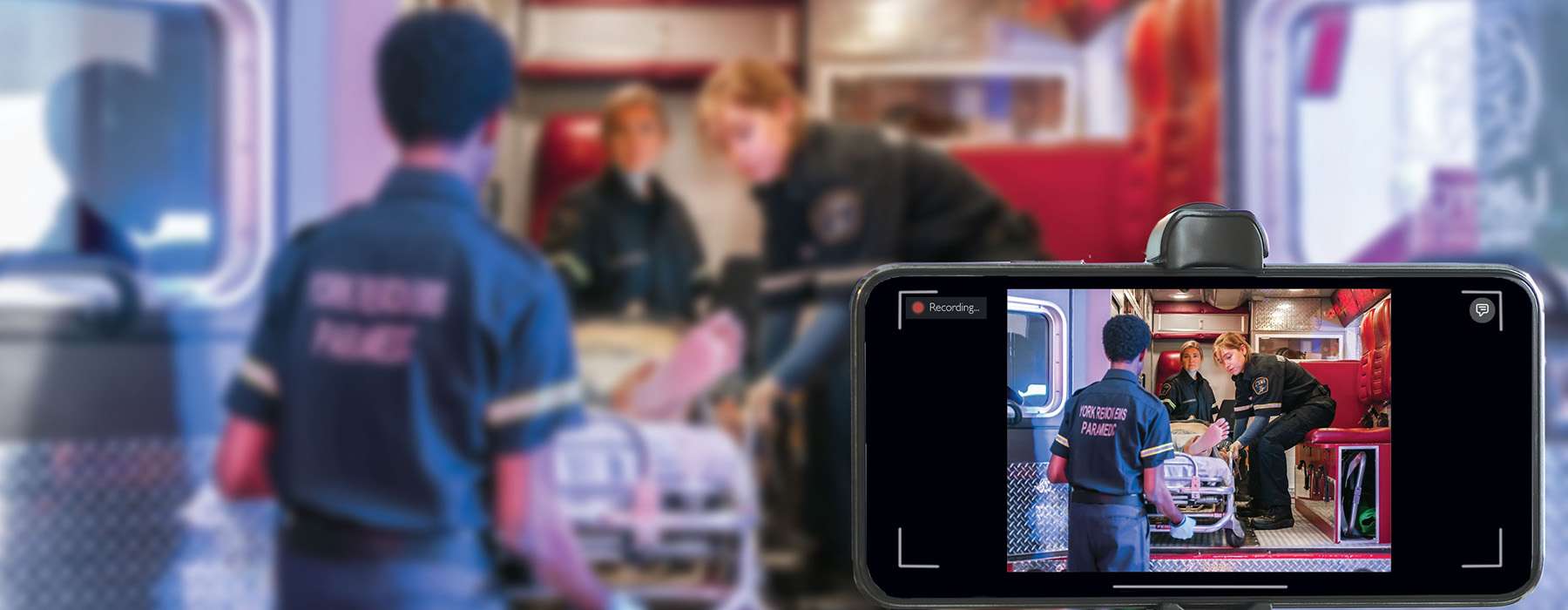 Camera app showing ambulance workers in action on phone camere.